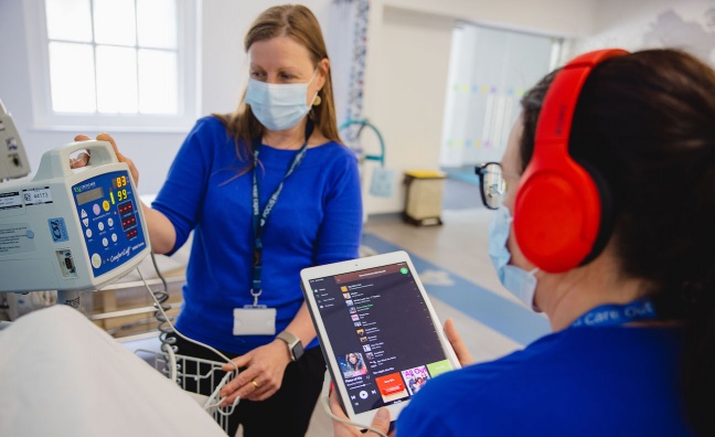Warner Music partners with UK health tech start-up to trial 'music as medicine'
