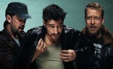 Mumford and Sons pose in a press shot
